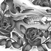 a Black and Grey Pig Skull with Roses around it. ..